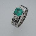 Emerald, diamond and white gold dress ring