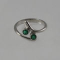 18ct white gold and tsavorite garnet engagement ring