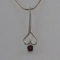 Garnet suspended from Heart shape