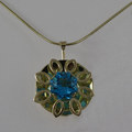 Blue topaz 9ct gold pendant